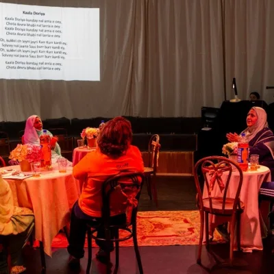 People taking part in poetry at Festi Dale